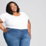 defining your body woman in plus size skinny jeans and white t-shirt